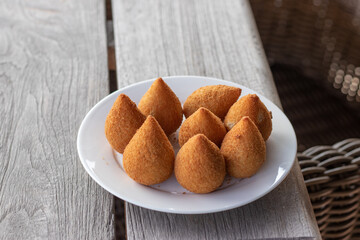 Coxinhas, brazilian snacks, finger food, tasty fried food made with chicken