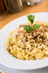 Turkish Noodle / Eriste with cheese, walnuts on wooden background