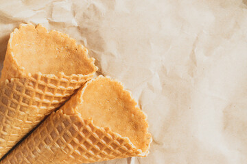 Ice cream waffle cup. Empty waffle cups on crumpled craft paper.