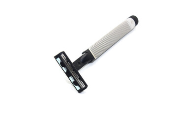Fototapeta premium A picture of used hair razor on white background