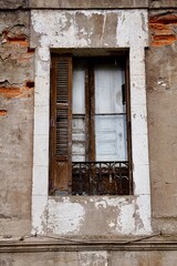Obraz na płótnie Canvas broken window on the abandoned house, architecture in Bilbao, Spain