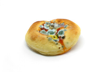 Moldy pizza isolated on white background.