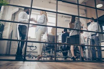 Low angle view full body profile side photo of business formalwear sharks people have start-up growth gathering tell talk say speak crisis way out solution in workplace workstation