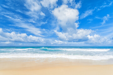 Fototapeta na wymiar Beach blue sea waves and blue sky