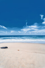 Ocean beach with blue water