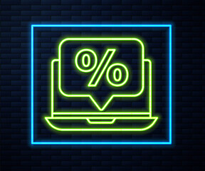 Glowing neon line Percent discount and laptop icon isolated on brick wall background. Sale percentage - price label, tag. Vector Illustration.
