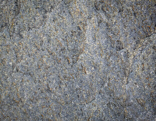 Dark grey black stone background or texture. Selective focus