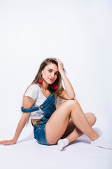 Obraz premium young pretty teenage girl posing cheerful on white background isolated, lifestyle people concept