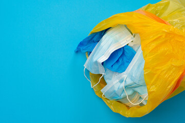 Protective equipment, masks and gloves, on blue background