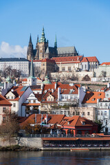 Obraz premium Vltava River and Prague Castle upon a hill