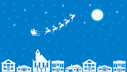 Santa flying in a sleigh through the night sky over the city