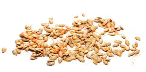 Muscat squash seeds pile isolated on white background