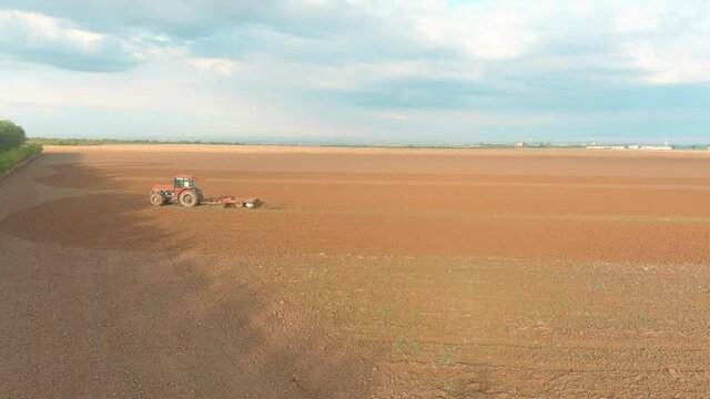 Tractor on field Aerial Drone
