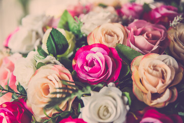 Obraz na płótnie Canvas valentine day background, wedding bouquet roses flower close up in retro filter