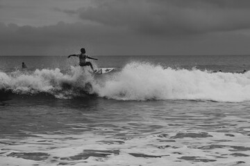 surfing the wave. Bali