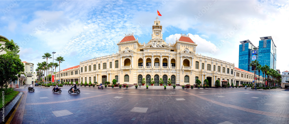 Wall mural panorama of building of people's committee in hochiminh city. it's was built during the vietnamese p