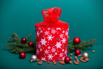 Cristmas Gift Present Brown Box with, Fir Brances, Nuts and Winter Decorations. Text Space. Rustic Style