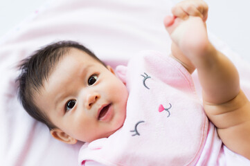 cute and adorable asian baby portrait close up