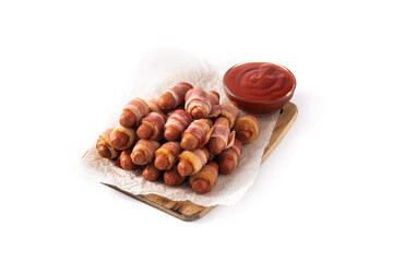 Obraz premium Pig in blankets. Sausages wrapped in smoked bacon isolated on white background
