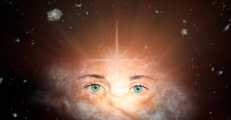 The concept of clairvoyance. Piercing green eyes looking into the future against the background of the galaxy. Paranormal abilities, clairvoyance, divination. Elements of this image are provided by NA - obrazy, fototapety, plakaty