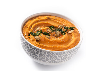Pumpkin hummus in bow isolated on white background 