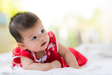 Cute asian baby with Chinese red dress