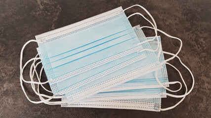 coronavirus COVID-19 pandemic. antiviral medical mask for protection against corona virus. Surgical protective mask. quarantine, stay at home