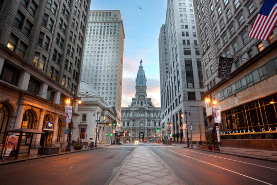 City hall and empty Broad Street at dawn in Philadelphia.
