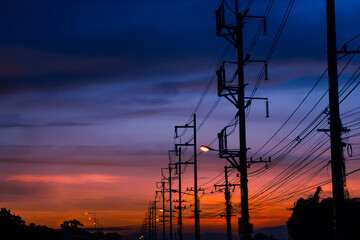silhouette electric cable line on poles
