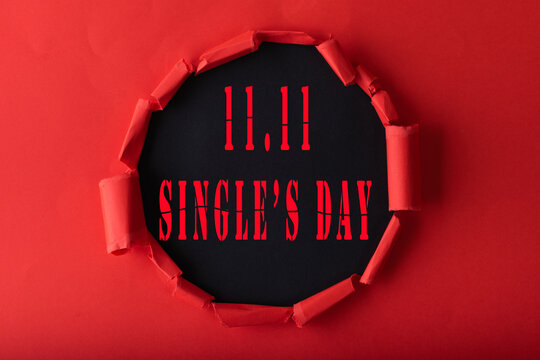 11.11 Single day sale. Red circle torn paper with 11.11 Single days sale on Black color background