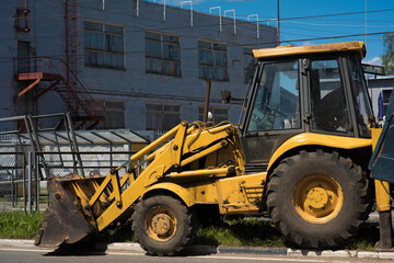 Road repairs with a tractor.