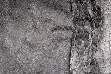 Black leather and fake alligator skin textures background