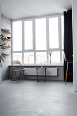 Modern home interior with chairs and coffee table