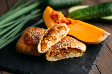 Cut oriental dish baked pie with pumpkin samsa
