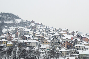 Fototapeta na wymiar First winter snow in the city of Uzice, Serbia