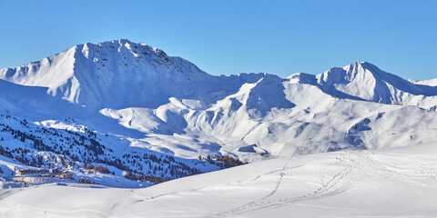 Panoramic view of the snowy high-altitude mountain range near the  Tignes ski resort in France...