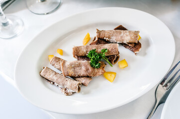 Cold meat dish. Boiled beef tongue.