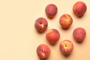 Sweet peaches on color background