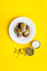 Raw coconut and chocolate energy balls, top view