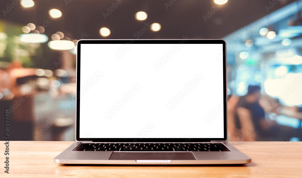 Fototapete laptop blank screen on wood table with coffee cafe background, mockup, template for your text, clipp