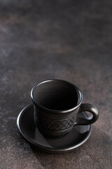 Black ceramic empty coffee cup