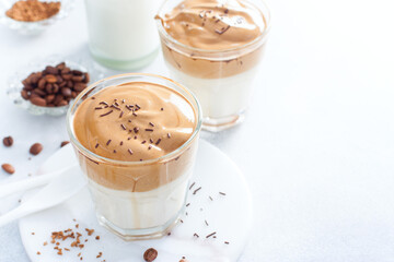 Cold drink with coffee, milk, sugar and water, dalgon coffee, horizontal, copy space