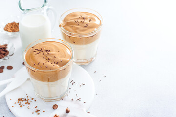 Cold drink with coffee, milk, sugar and water, dalgon coffee, horizontal, copy space