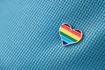 Heart shaped icon, color LGBT community pinned on clothes - 385025322