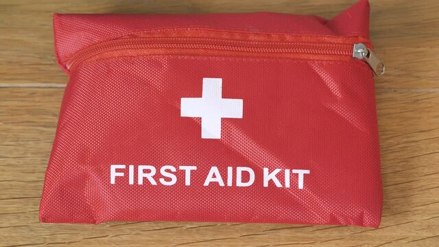 Red first aid kit top view