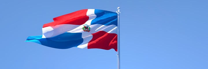 Naklejka premium 3D rendering of the national flag of Dominican Republic waving in the wind