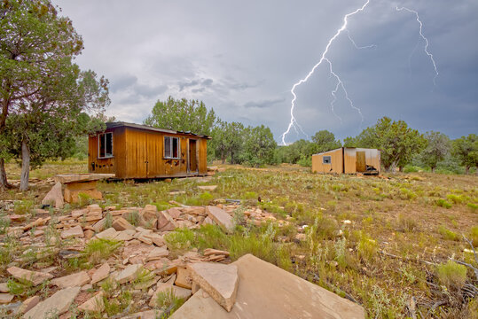Lightning striking from a monsoon storm building up over the abandoned Mexican Quarry near Perkinsville, Arizona