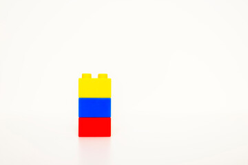 Primary colors. Red, yellow and blue building blocks. Isolated on white background.