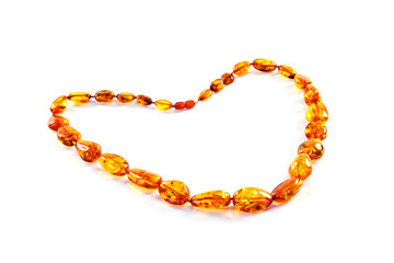 beautiful beads of amber lying in the form of a heart