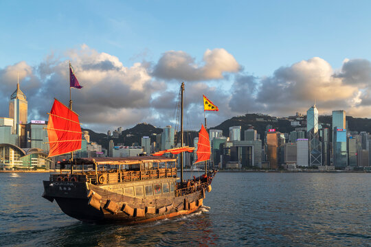 Junk Boat And Skyline Of Hong Kong Island, Hong Kong, China